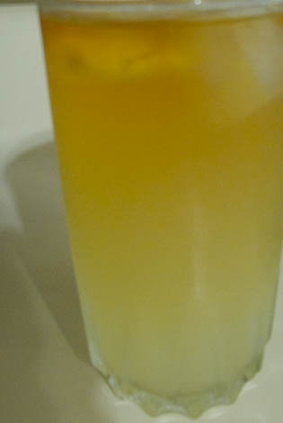 Mr. Palmer glass of lemonade topped with iced tea